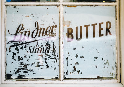 Close-up of text on old door