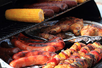 Close-up of meat on barbecue grill