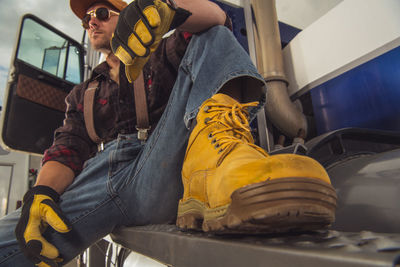 Low angle view of men working