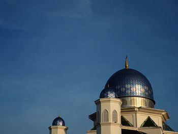 Low angle view of cathedral against blue sky