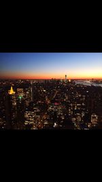 Illuminated cityscape at night