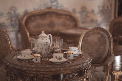 Close-up of tea set table at home