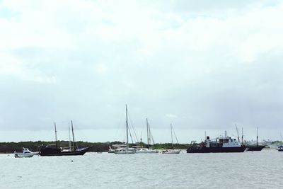 Boats sailing in sea
