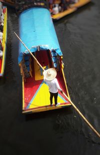 Boy sitting in boat