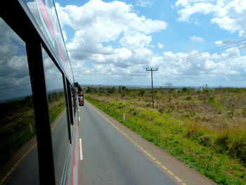 Road amidst landscape against sky