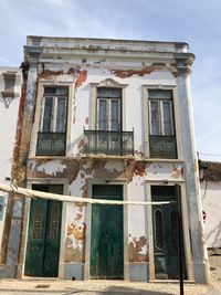 Low angle view of old building against sky