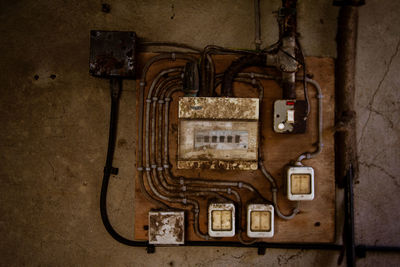 Close-up of old telephone on wall