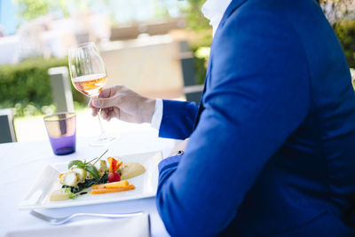 Close-up of man eating food