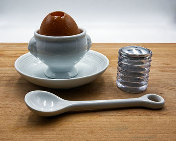 High angle view of coffee cup on table