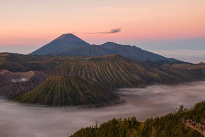 Panoramic view of volcanic landscape against sky during sunset