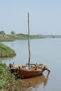 Boats in calm lake