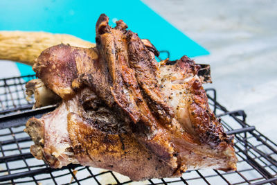 Close-up of meat on barbecue grill