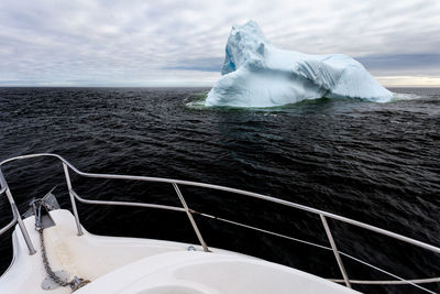 An iceberg in the gulf of st lawrence, quebec viewed from a boat.