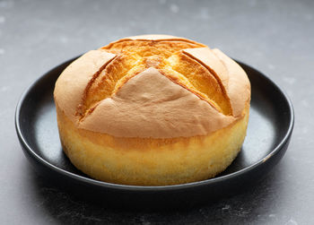 Close-up of bread in plate on table