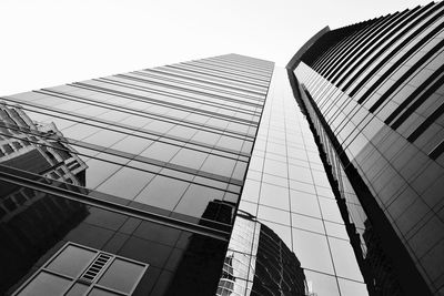 Low angle view of modern buildings against clear sky