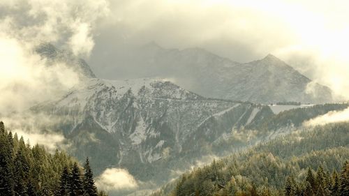 Scenic view of mountains against sky during winter