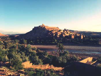 Panoramic view of buildings against sky during sunset