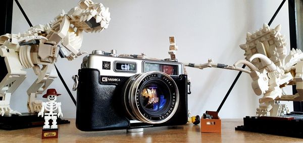 Close-up of camera on table