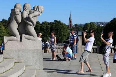 Statue of woman against clear sky