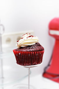 Close-up of cupcakes on cake