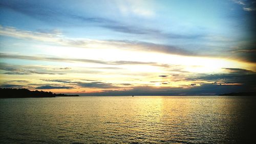 Scenic view of sea at sunset