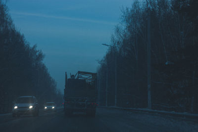 Cars on road at night