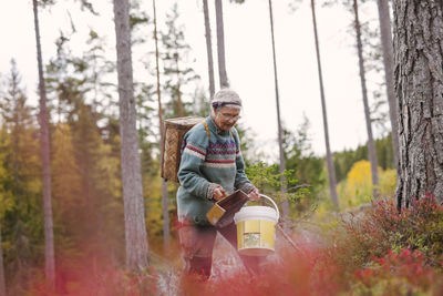 Man sitting in forest