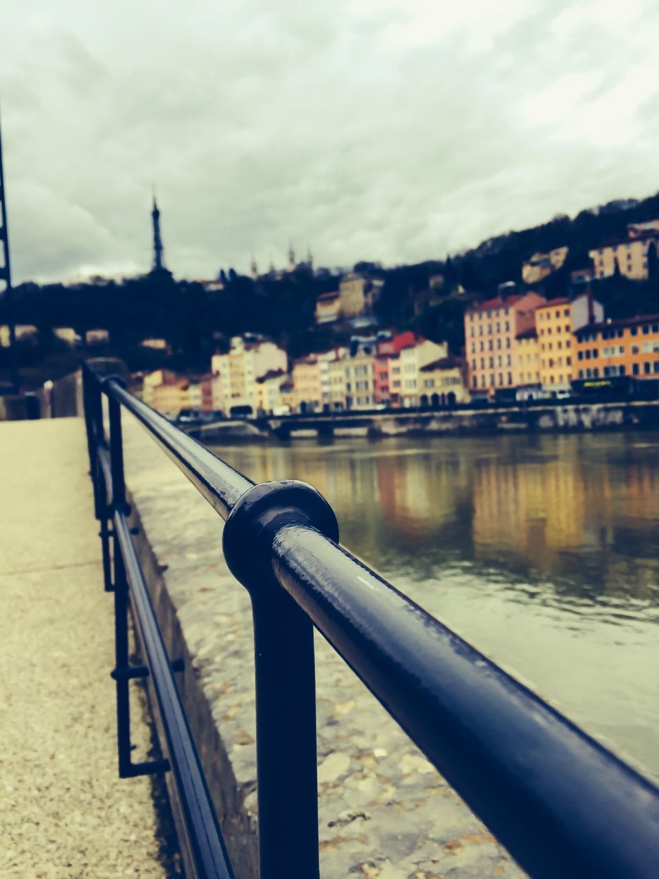 architecture, built structure, building exterior, water, river, sky, railing, city, cloud - sky, bridge - man made structure, cityscape, cloud, connection, transportation, cloudy, canal, residential structure, residential building, outdoors, sea