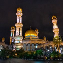 Illuminated cathedral against sky at night