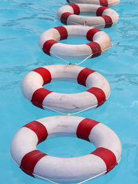 High angle view of inflatable rings in swimming pool