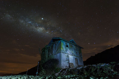 Low angle view of building against sky at night