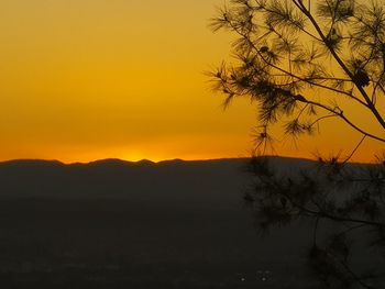 Scenic view of silhouette landscape against sky during sunset