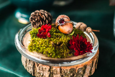 Close-up of flowers in bowl on table