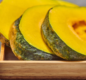 Close-up of lemon slice on cutting board