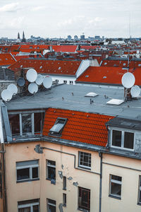 Houses against sky during winter