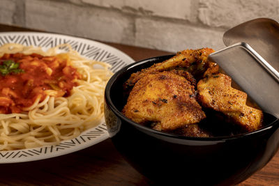 Close-up of food served on table