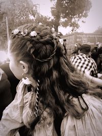 Close-up of woman with braided hair