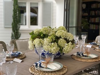 Potted plant on table by building