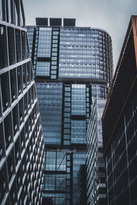 Low angle view of skyscrapers against sky