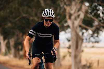 Portrait of woman riding bicycle