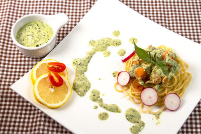 High angle view of food served on table