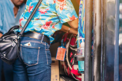 Rear view of couple holding hands