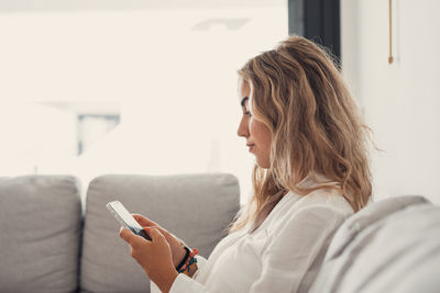 Young woman using mobile phone