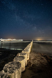 Scenic view of sea against sky at night