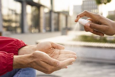 Cropped hand of man holding hands