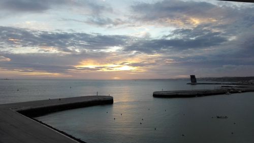 Scenic view of sea against sky during sunset