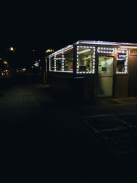 Illuminated street at night