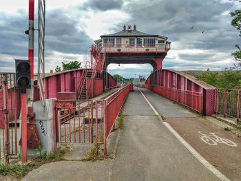 View of bridge against cloudy sky