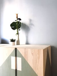 Close-up of vase on table at home