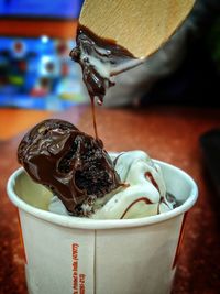 Close-up of ice cream on table